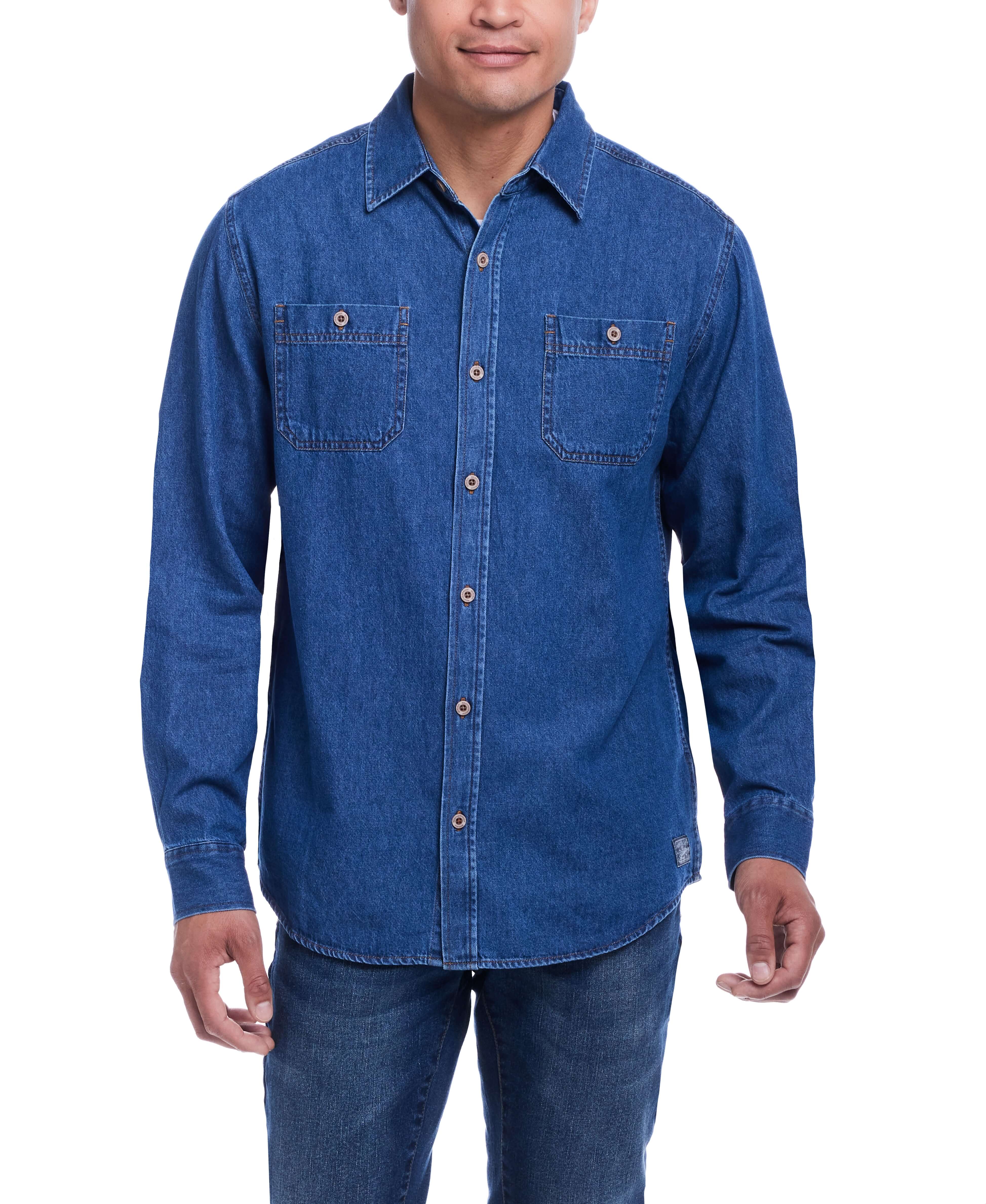 Man wearing a medium indigo unlined denim overshirt with button-up front and two chest pockets.