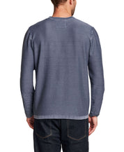 Back view of Twill Stonewash Sweater in Insignia Blue, showcasing its airy twill knit and classic roll-neck design.