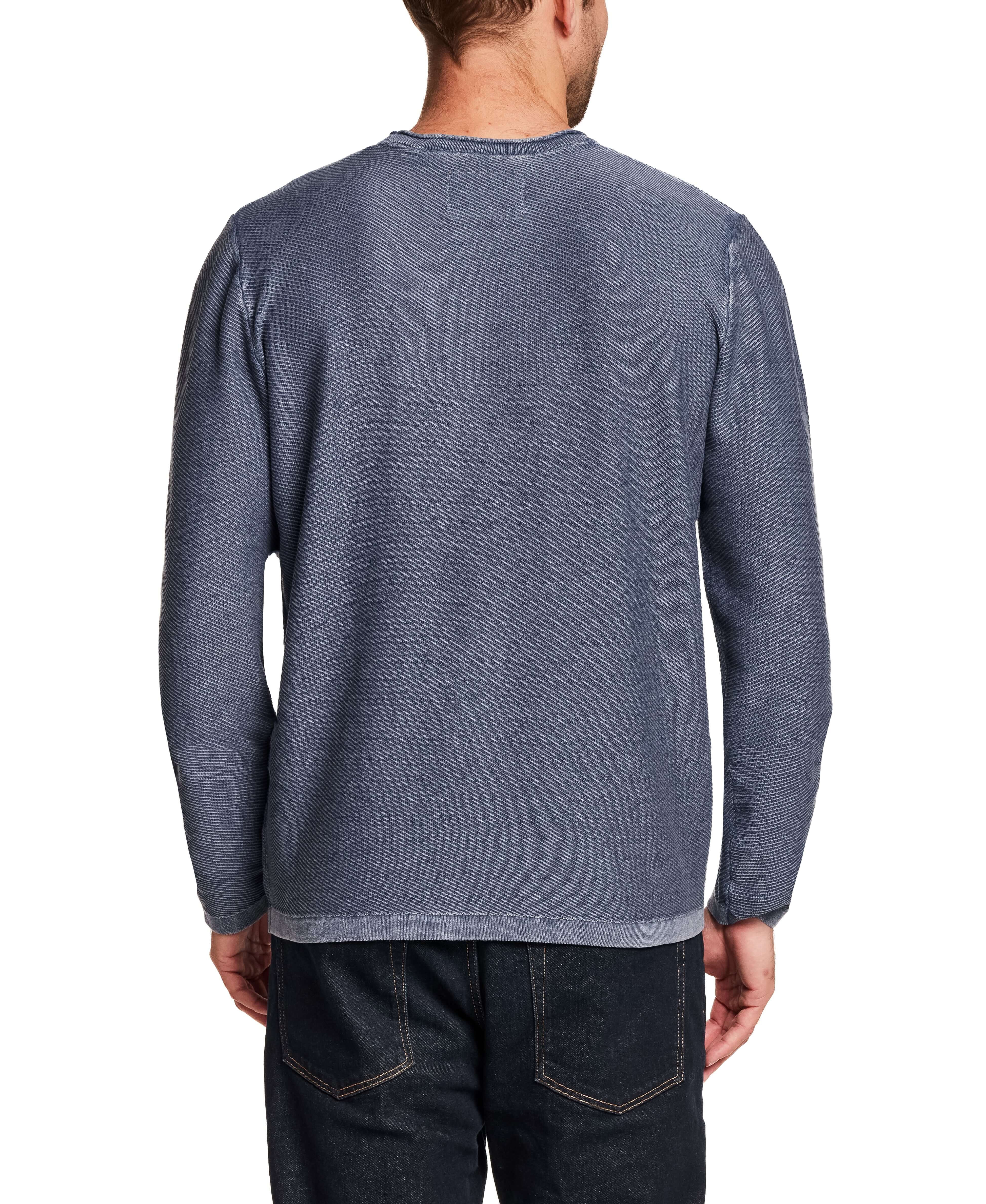 Back view of Twill Stonewash Sweater in Insignia Blue, showcasing its airy twill knit and classic roll-neck design.
