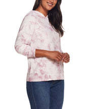 Water Color Hoodie  In Nirvana worn by a model, showcasing unique tie-dye design and relaxed fit.