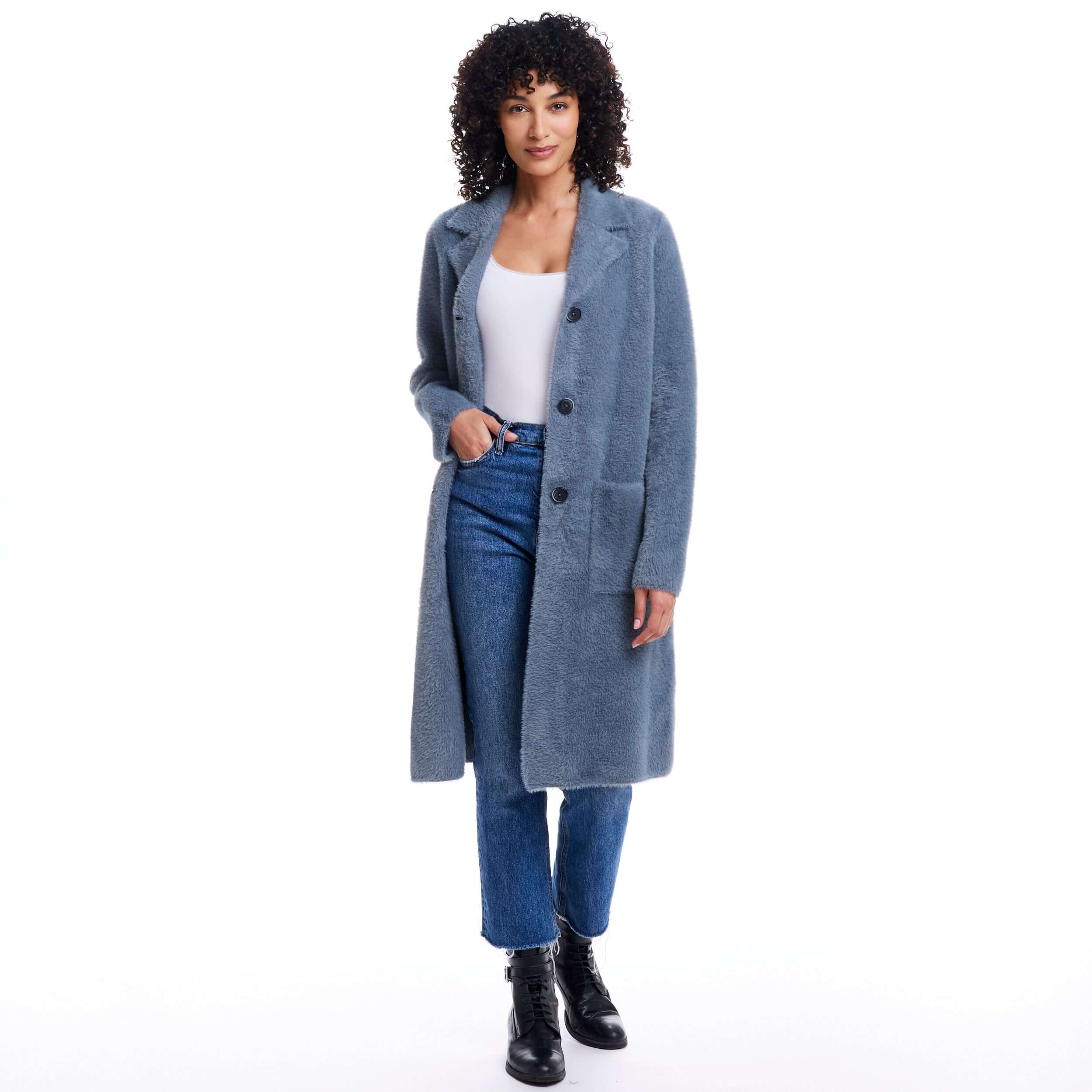 Women's mid charcoal plush coatigan with button closure and front pockets, styled with jeans and boots.