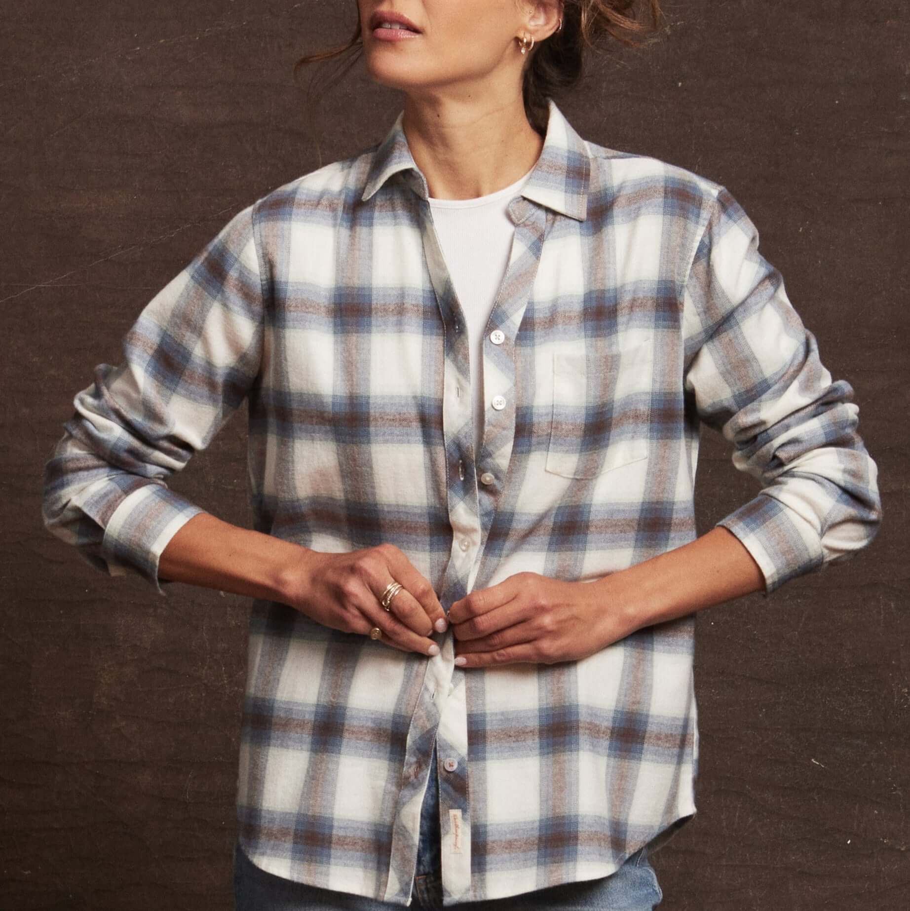 Women's blue stretch flannel shirt featuring a classic fit, notch V-neck, button placket, and casual rolled sleeves.