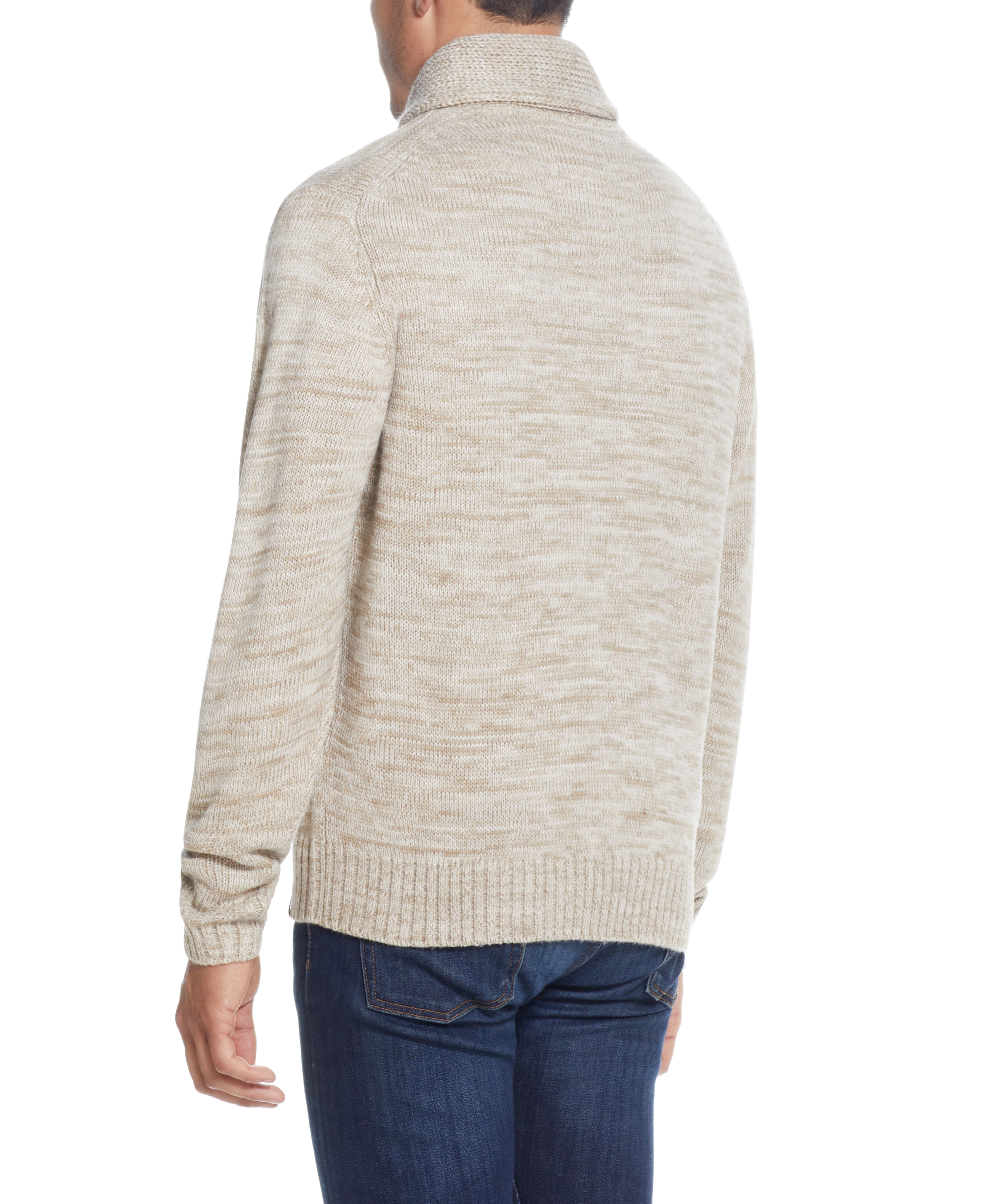 FISHERMAN SHAWL SWEATER IN LIGHT KHAKI viewed from the back, showcasing the relaxed fit and rib-knit hem.