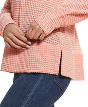 Women'S Dolman Mesh Knit Hoodie In Coral, showcasing breathable mesh fabric and stylish side slit detail.