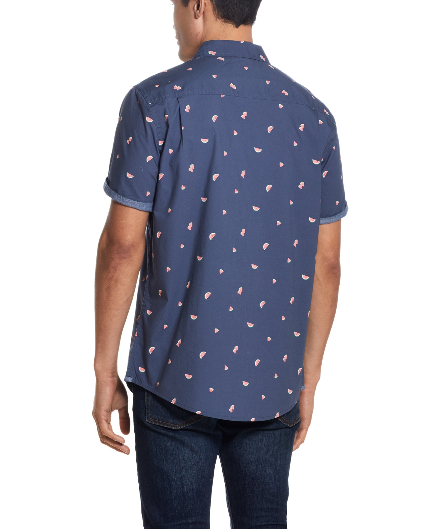 Back view of a man wearing the Peached Poplin Mini Print In Watermelon shirt featuring a playful mini print.