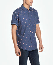 Model wearing Peached Poplin Mini Print In Watermelon short sleeve shirt with watermelon print.